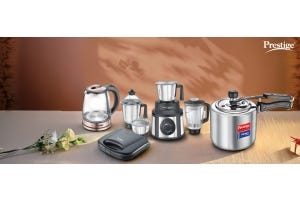 Prestige kitchen appliances including a kettle, blender, mixer, sandwich maker, and pressure cooker displayed as perfect wedding gifts for newlyweds.