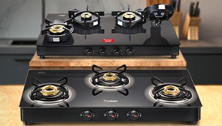 Two Prestige Glass Top Gas Stoves (4 Burner and 3 Burner) Showcasing Different Burner